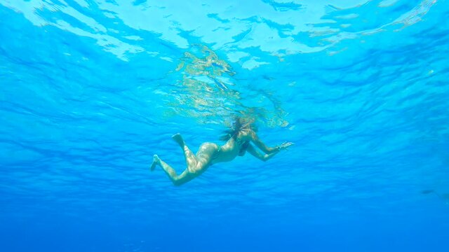 Girl Swiming in Blue Waters Summer Snorkeling