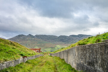 The ruins of Lenan Head fort at the north coast of County Donegal, Ireland.