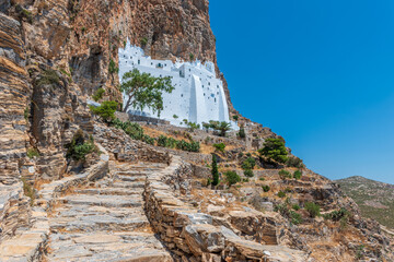 The famous Hozoviotissa Monastery standing on a rock over the Aegean sea in Amorgos island,...