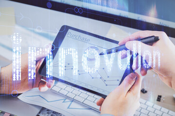 Multi exposure of man's hands holding and using a digital device and data theme drawing. Innovation concept.