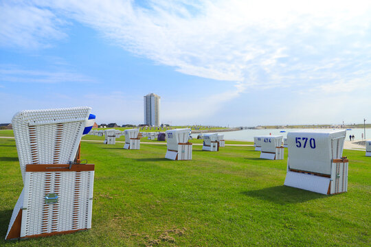 View at the beach with beach chairs and the lagoon of Büsum, North sea - Germany