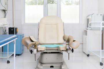 Gynecological chair in the clinic ward. Chair for inspection of pregnant women. Front view