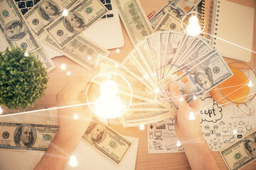 Multi exposure of social network theme drawing hologram and USA dollars bills and man hands.