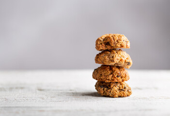 Fototapeta na wymiar Stack of fresh oatmeal cookies