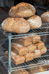 Homemade bread , rustic baked bread in wooden background