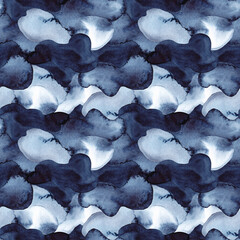 Decorative Christmas seamless pattern of abstract watercolor spots in blue and dark blue indigo colour. Winter hand painted texture.