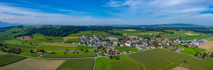 Fototapeta na wymiar Aerial view around the city Dietwil in Switzerland on a sunny day in summer.