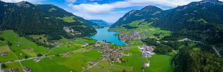 Fototapeta na wymiar Aerial view around the city Lungern in Switzerland on a sunny day in summer.