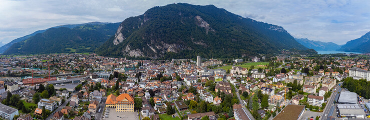 Fototapeta na wymiar Aerial view around the old town of the city Interlaken in Switzerland on an afternoon in summer.