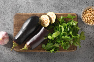 Ingredients for Baba ganoush appetizer from baked eggplants,parsley, walnuts, garlic and olive oil...