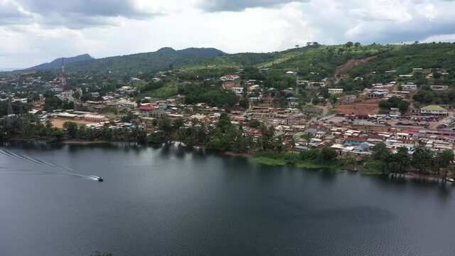 Aerial Adome village homes Volta river Ghana Africa 1. Main river system in West African country of Ghana. Akosombo dam generating hydroelectricity. Largest man made reservoir by area in the world.