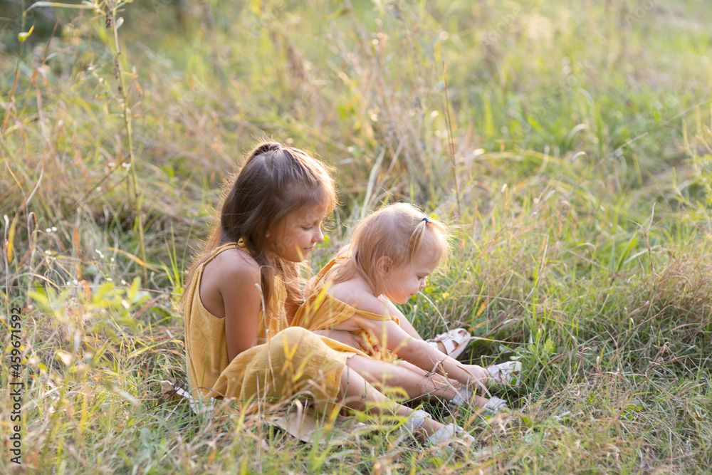 Poster Two girls, seven years old and one age