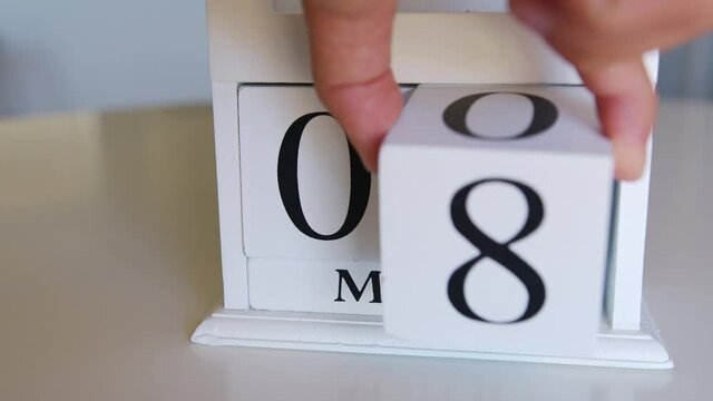 Wooden calendar with an important event for 8 Marh, International Women's Day.