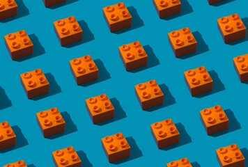 Background for the design and banner. An orange detail from a children's designer on a blue background. Pattern.