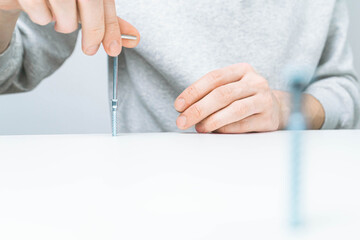 The process of assembling modular furniture using various