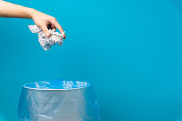Garbage can put on a trash bag. For copy space