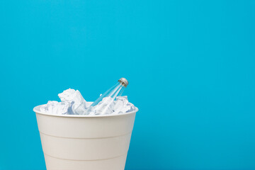 The glass bottle is thrown for recycling. For disposal