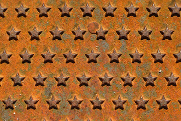 Rusty metal background with stars. 