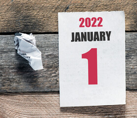 1 January 2022 on a calendar sheet.