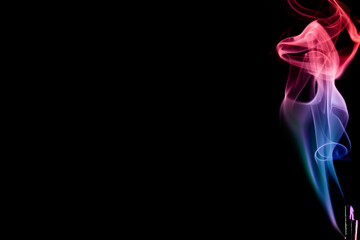 Obraz premium Abstract colorful smoke on a black background. Isolated.