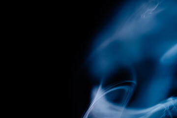 Abstract colorful smoke on a black background. Isolated.