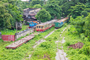 Railway wagons on a railroad track in the area of a train station - obrazy, fototapety, plakaty
