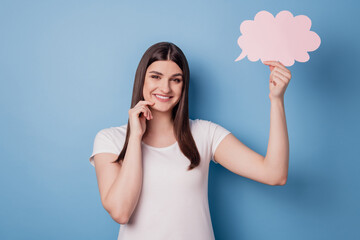 Portrait of cheerful positive lady finger chin hold thought cloud on blue background