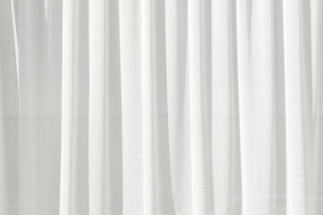 Fabric texture if curtains with pleats.