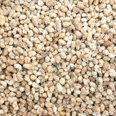 Texture of mulberries on the market counter.