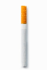 Single cigarette on white background. Copy Space. Close up.