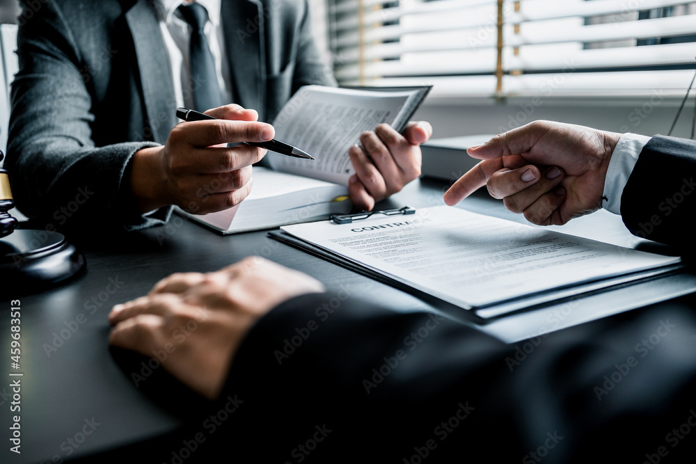 Wall mural close up of businessmen or lawyers discussing contract or business agreement at law firm office, bus