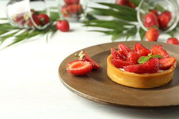 Concept of delicious food with strawberry tart, space for text