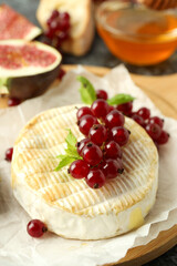 Concept of tasty food with grilled camembert, close up