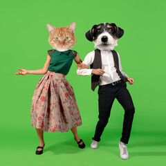 Modern design, contemporary art collage. Inspiration, idea, trendy magazine style. Young man and woman headed with dog's heads dancing isolated over green background