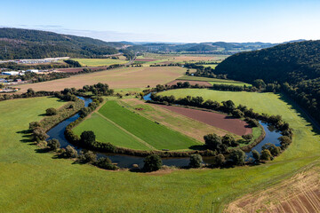 Fototapeta na wymiar The Werra River in the Werra Valley at Herleshausen between Hesse and Thuringia in Germany