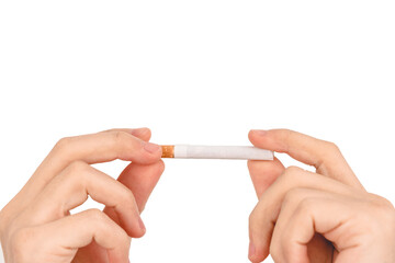 Hand breaks a cigarette in the white background.