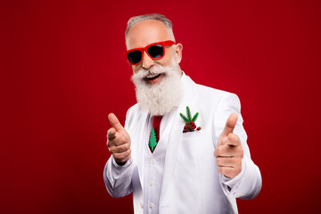 Photo of funny funky mature man dressed white christmas costume dark glasses pointing fingers you...
