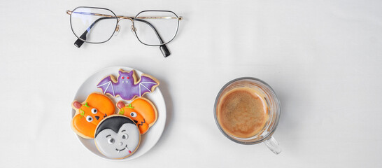 hot espresso coffee  or chocolate cup with funny Halloween Cookies. Happy Halloween day, Trick or Threat, Hello October, fall autumn, Traditional, party and holiday concept