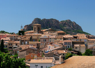 The Old Town Of Roquebrune D'Argens In Front Of A Giant Rock In France On A Beautiful Summer Day...