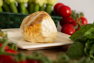 Mozzarella Agerola, Naples, Italy. Typical smoked mozzarella or provola cheese from the Sorrento coast