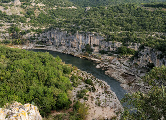 Aerial View Into The Canyon Of The Gorges De L'Ardeche With Reflections On The River Ardeche In France On A Beautiful Autumn Day