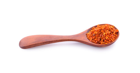 Cayenne pepper in a spoon isolated on a white background