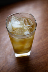 Alcoholic cocktail with ice and whiskey