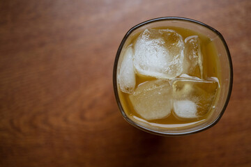 Alcoholic cocktail with ice and whiskey