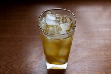 Alcoholic cocktail with ice and whiskey