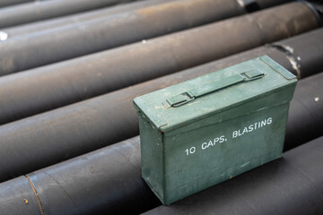 A metal ammunition box or bullet cartridge of M7 machine gun. Weapon and firearm object photo. Close-up.