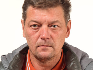 Obraz premium old not shaved man in glasses with facial expressions close-up