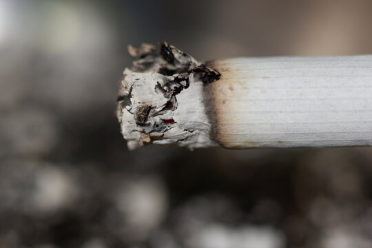 a cigarette burned by a smoker