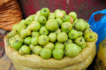 Selling fresh apples at the street market