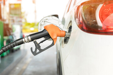 Refill and filling Oil Gas Fuel at station. Gas station - refueling. To fill the machine with fuel. Car fill with gasoline at a gas station. Gas station pump. 